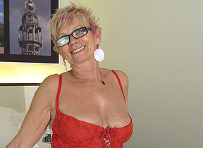Horny mature hussy playing with herself